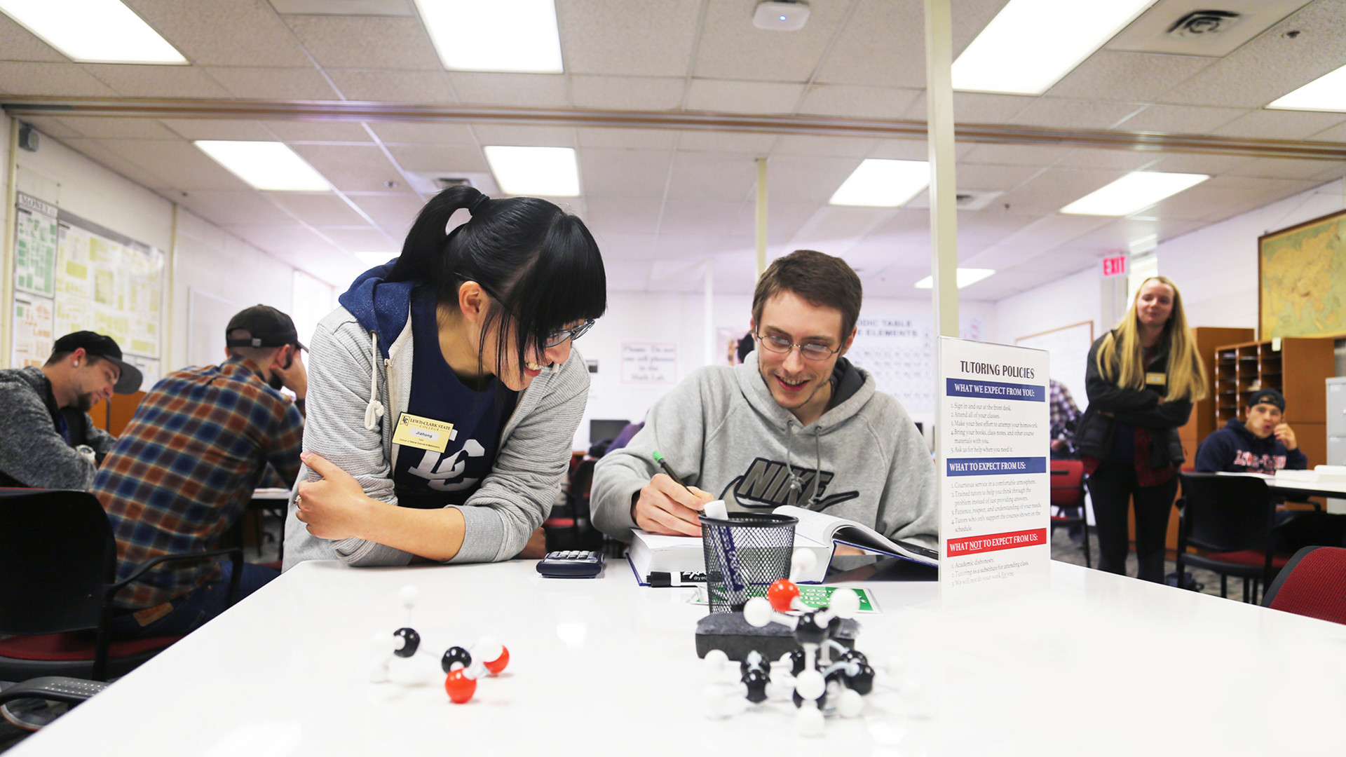 Math tutor tutoring student